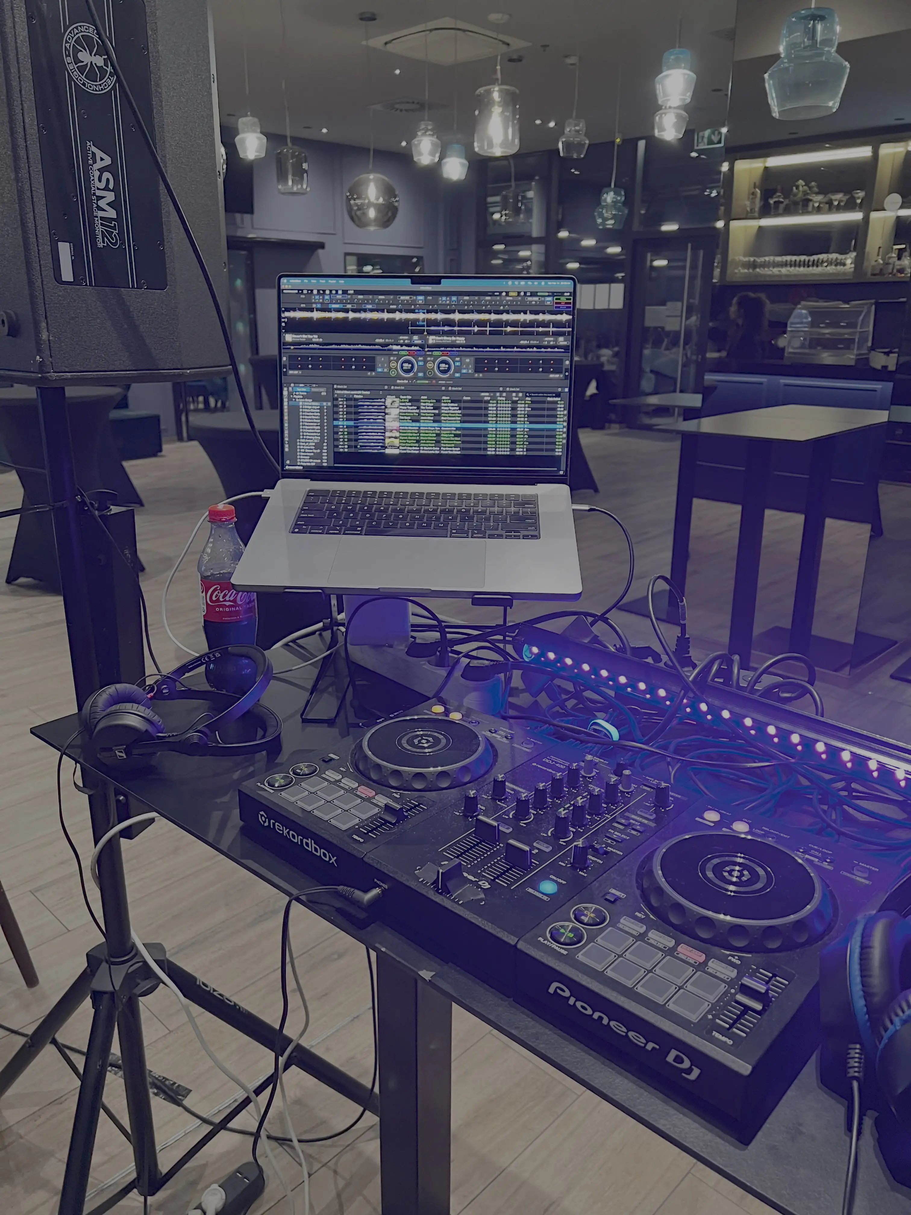 Pioneer DJ controller and MacBook with DJ software